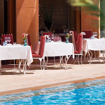 Es Saadi Marrakech Resort - Hotel Marrakesh Exterior photo The pool at the Four Seasons Hotel
